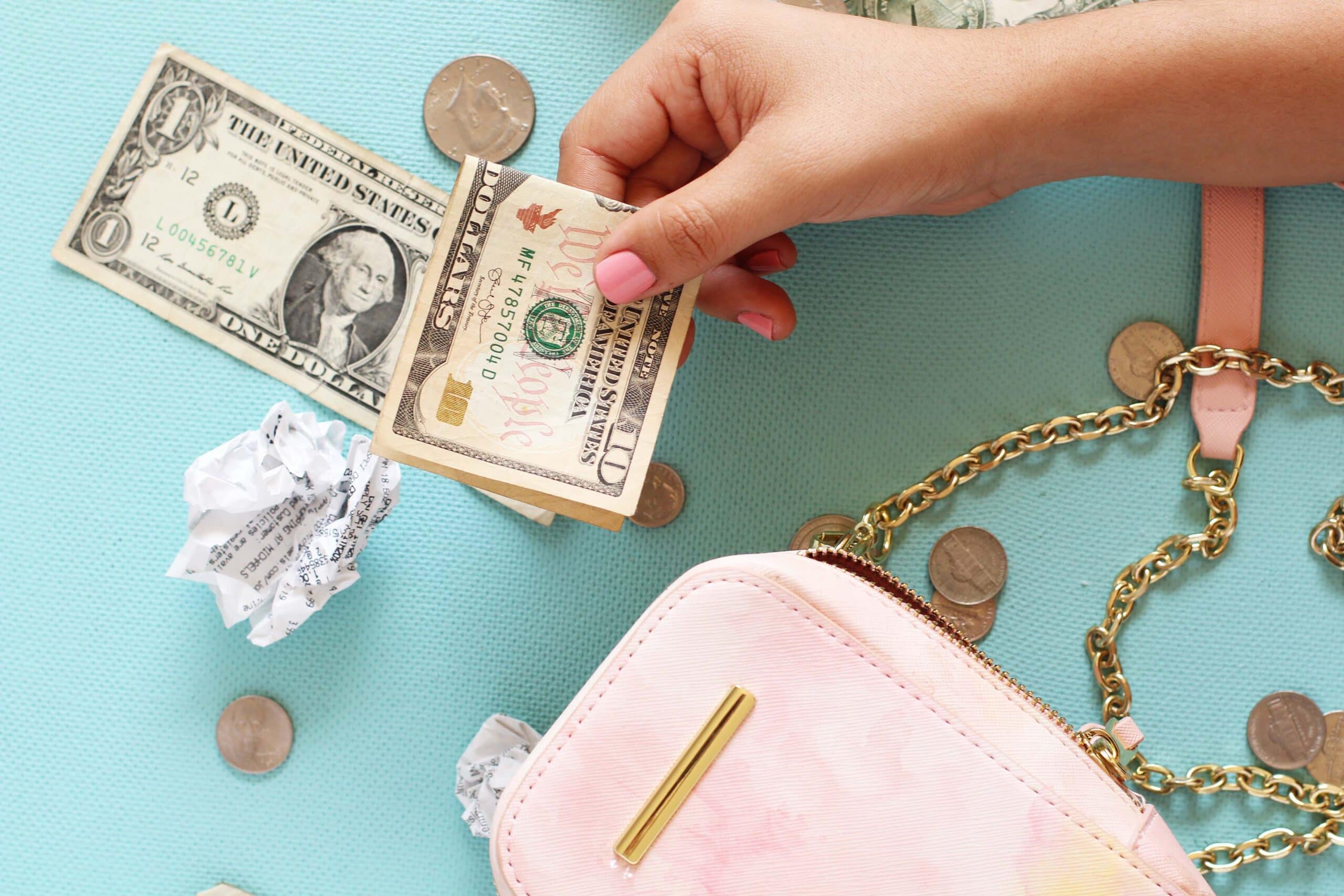 cash-dollars-and-purse-with-coins-scaled.jpg